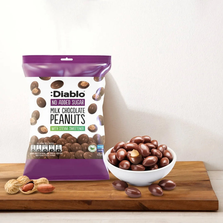 Diablo sin azúcar: cacahuetes recubiertos de suave chocolate con leche (40 g, 2,4 g de hidratos de carbono* computables)